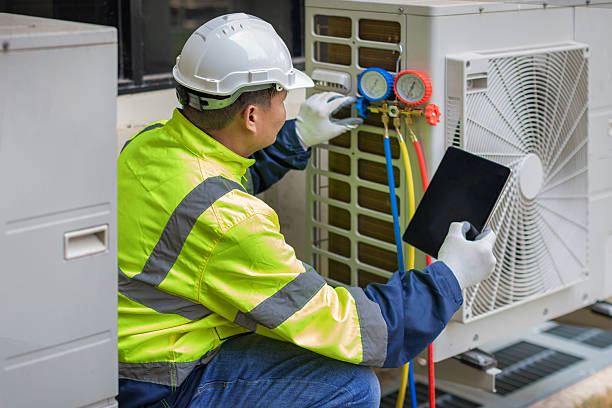 Professional Hvac technician working in Perryville, MD